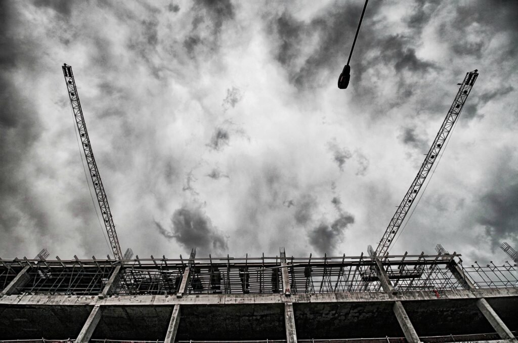 Construction of a building, construction cranes, building construction, sky, city,urban construction